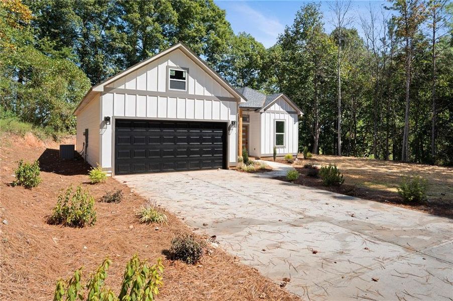 Front exterior of a new home in , Summerville, GA, highlighting curb appeal (Image 23).