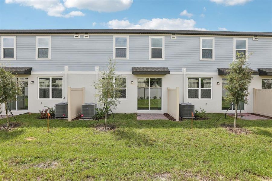 Exterior details and patio area of a home in Cagan Crossings West, Clermont (Image 3).