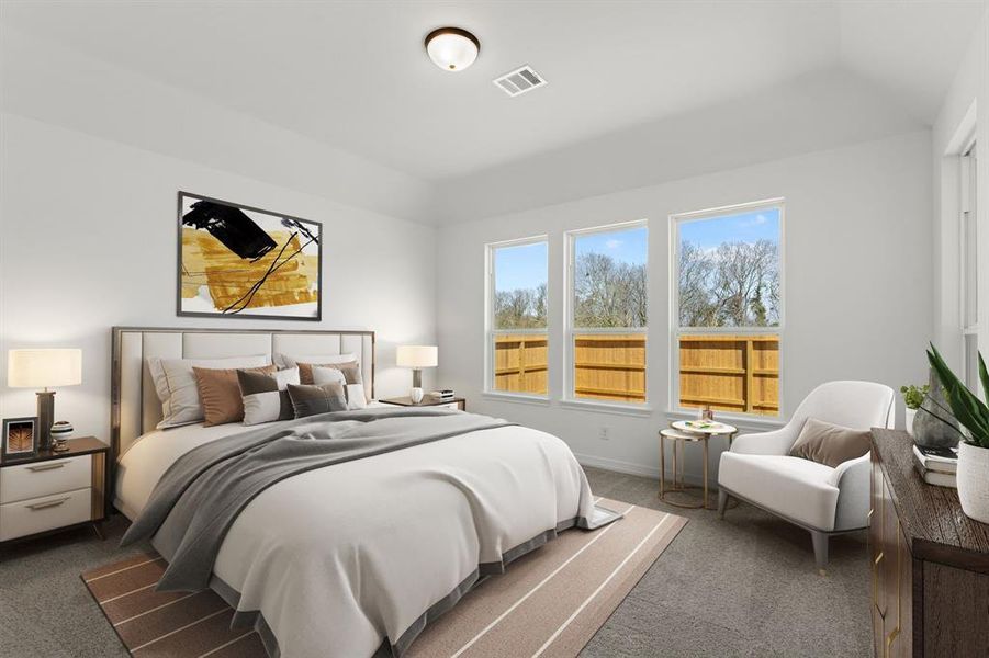 The primary bedroom is generously sized, creating a tranquil and spacious retreat that offers ample room for relaxation. Featuring plush carpet, high ceilings, fresh paint, and large windows that lets in natural lighting throughout the day.