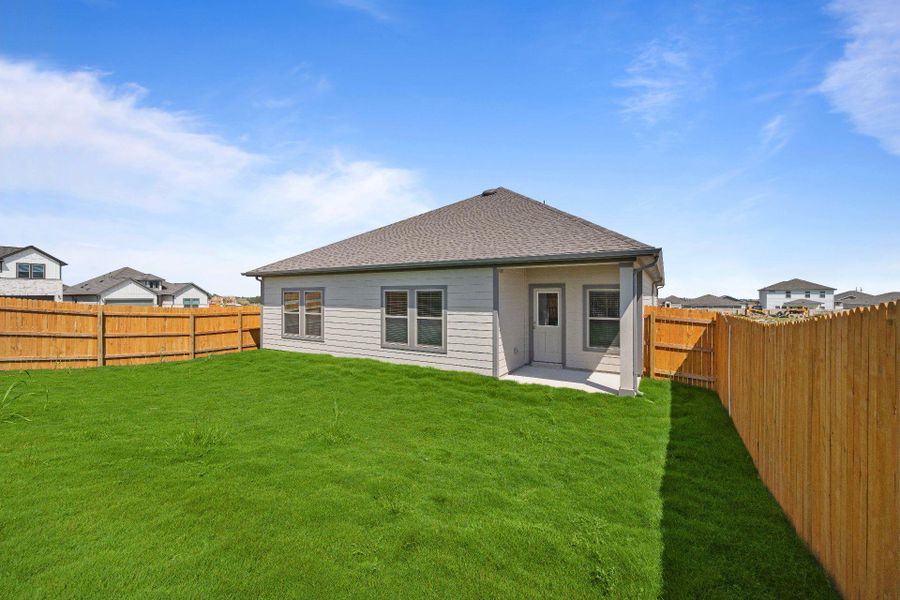 Rear of Home and Private Backyard