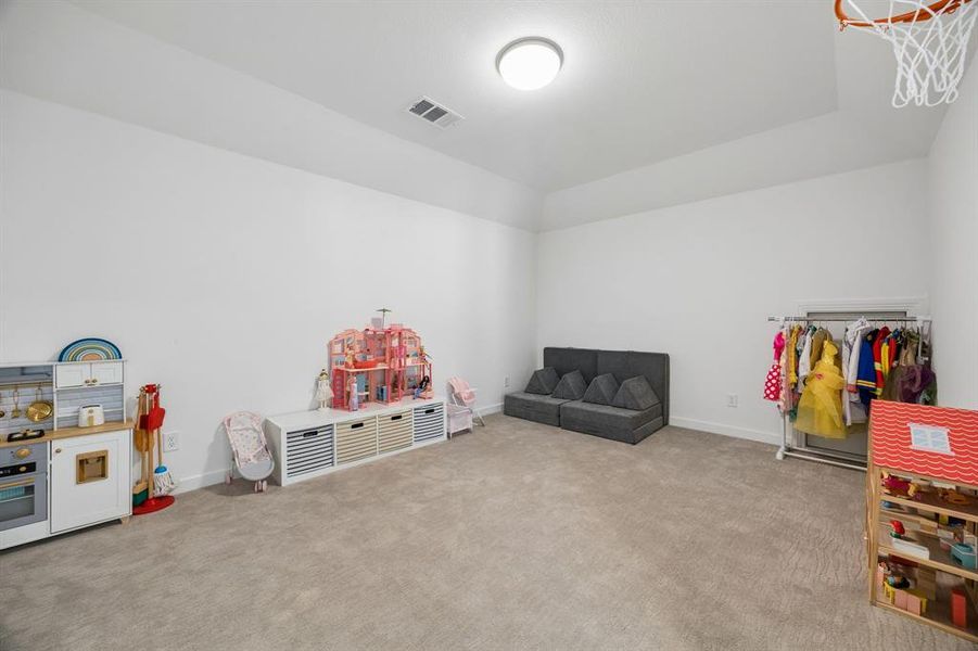 play room or theater play room or theater