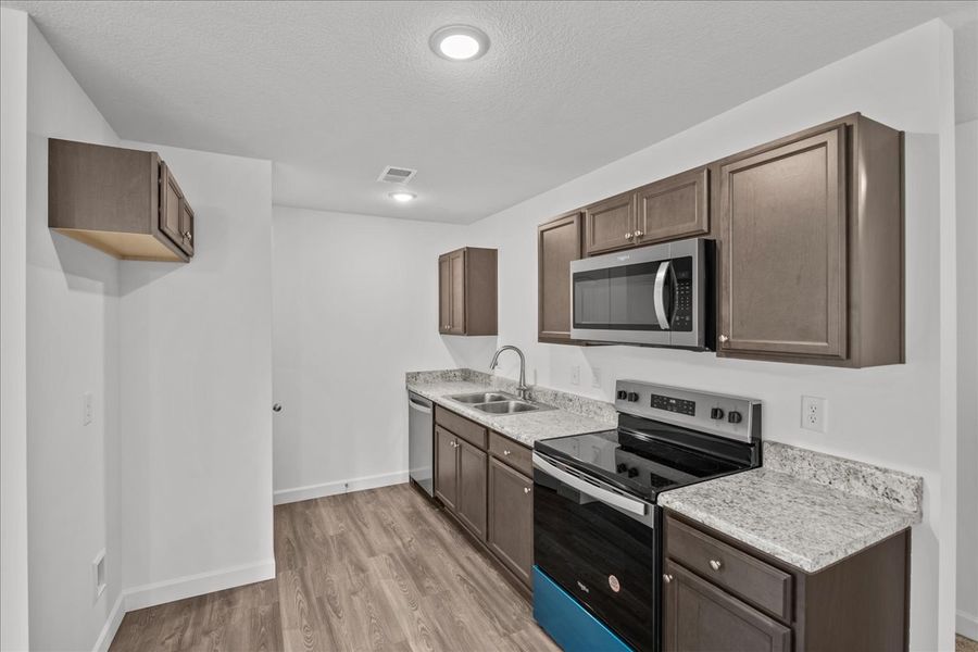Furnished interior in a model home at Gentry Place in Spartanburg (Image 7).
