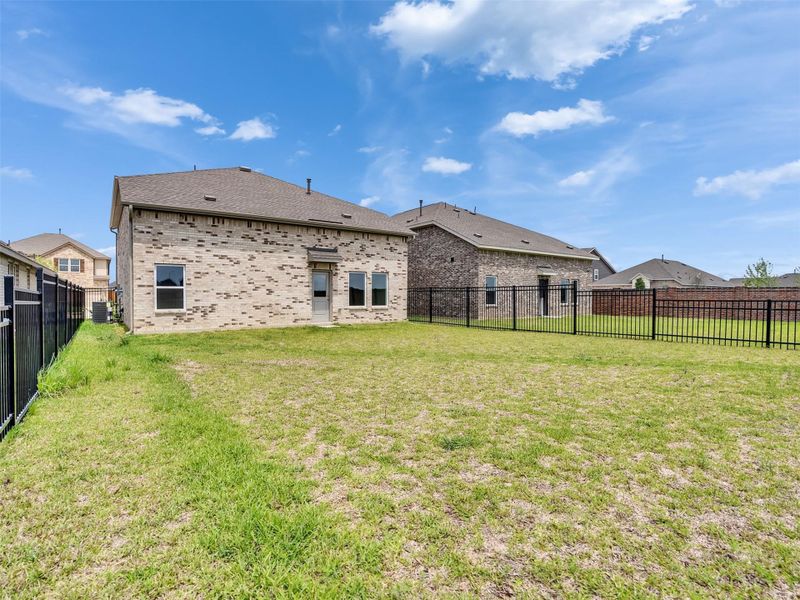 Exterior details and patio area of a home in , Katy (Image 29).