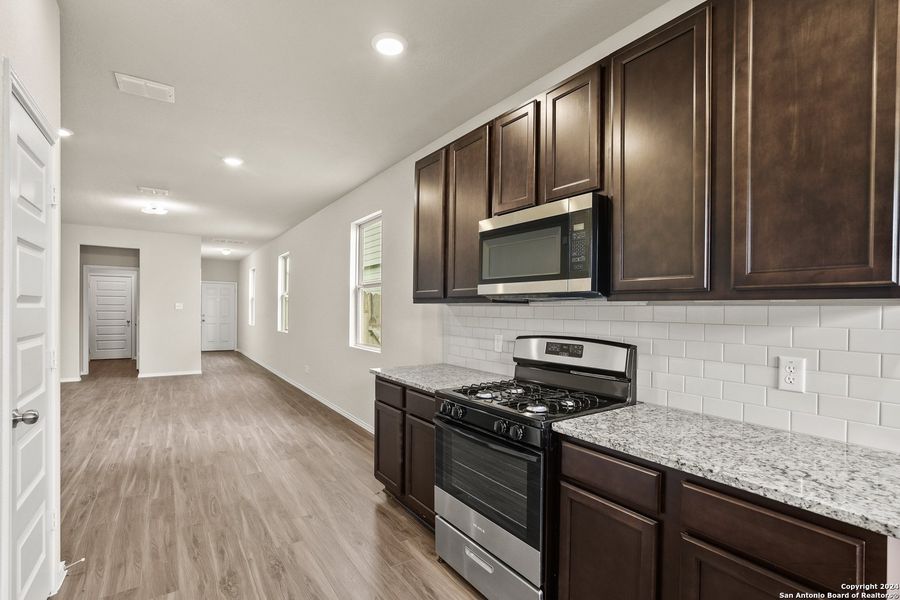 Furnished interior view inside a new home in Blue Ridge Ranch, San Antonio (Image 4).