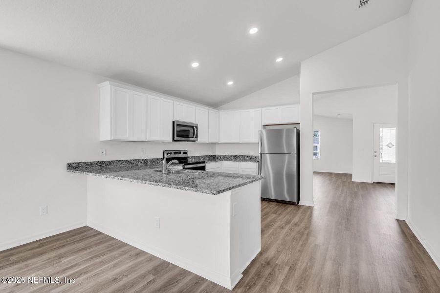 Furnished interior view inside a new home in Rolling Hills, Green Cove Springs (Image 9).