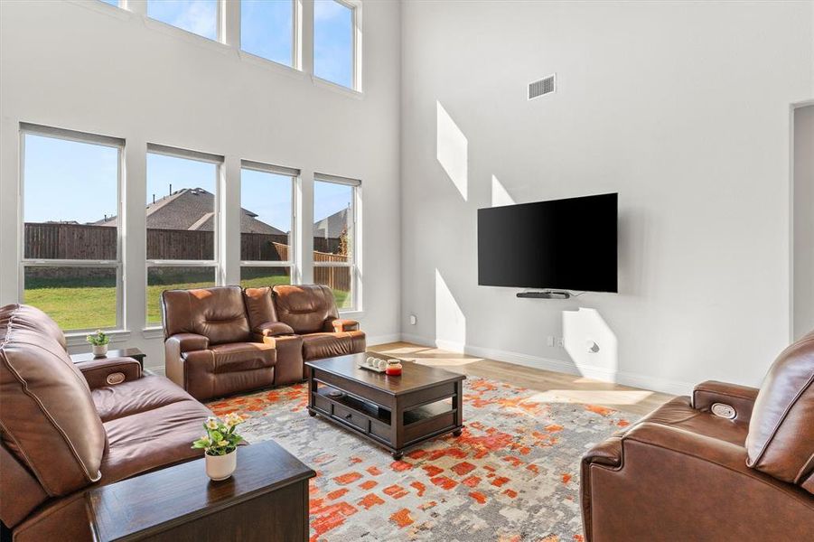Tall ceilings and upper windows in the Living Room!