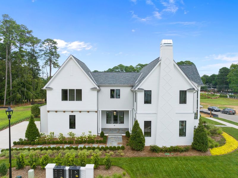 Representative exterior photo of a completed home built from the Abigail by Homes by Dickerson in The Founding at Blue Ridge, Raleigh, NC (Image 25). Representative exterior photo of a completed home built from the Abigail by Homes by Dickerson in The Founding at Blue Ridge, Raleigh, NC (Image 25).