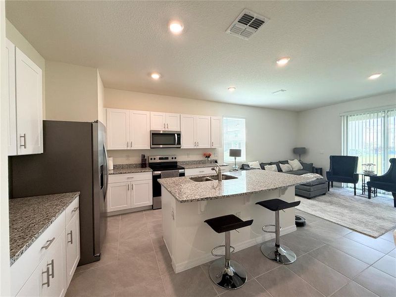 Furnished interior view inside a new home in , Kissimmee (Image 6).