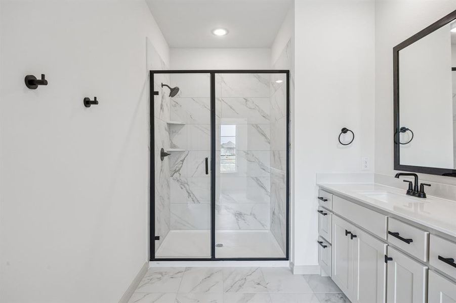 You'll enjoy your own spa like experience every day in this lovely spacious walk in shower!