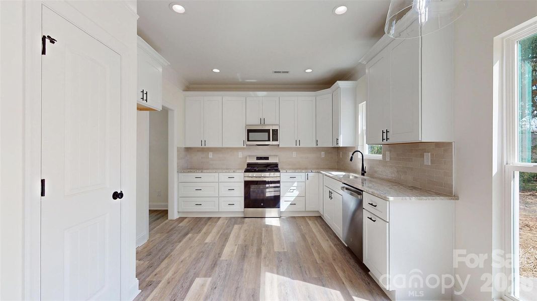 Furnished interior view inside a new home in , Monroe (Image 7). Furnished interior view inside a new home in , Monroe (Image 7).