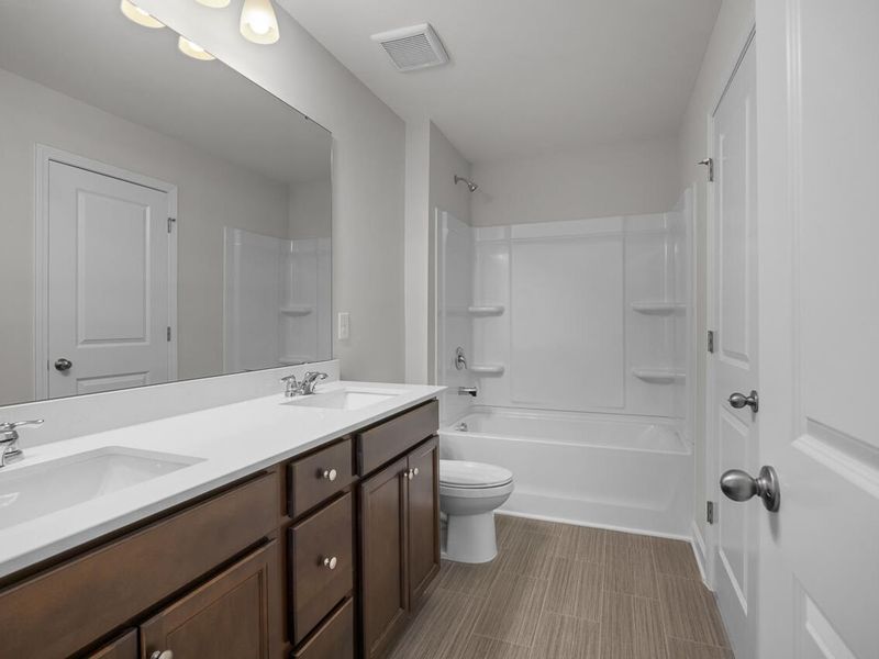 Furnished interior view inside a new home in Gregory Village, Lillington (Image 9). Furnished interior view inside a new home in Gregory Village, Lillington (Image 9).