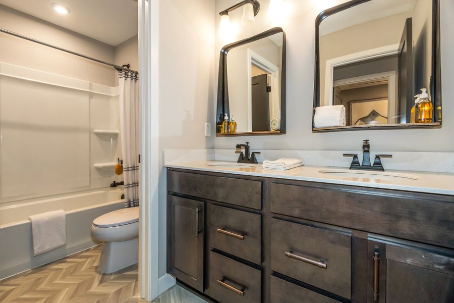 Representative furnished interior of a home built from the Wyatt by Fischer Homes in Twin Lakes, Hoschton (Image 68).