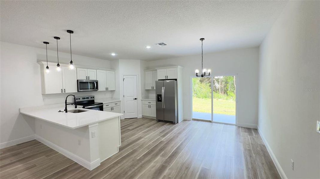 Furnished interior view inside a new home in , Citrus Springs (Image 3).