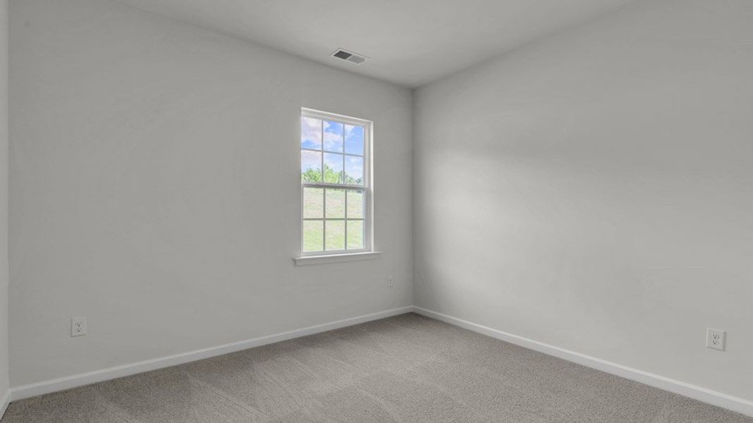Spacious, unfurnished interior of a new home in The Preserve at Kinsley, Jamestown (Image 13). Spacious, unfurnished interior of a new home in The Preserve at Kinsley, Jamestown (Image 13).
