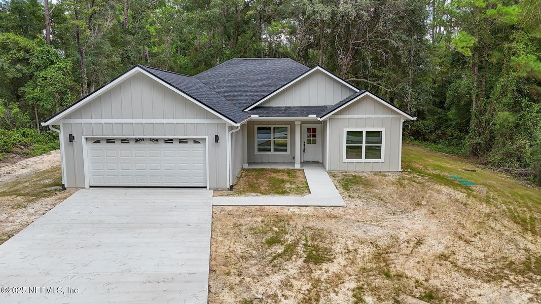 Front exterior of a new home in , Melrose, FL, highlighting curb appeal (Image 20).