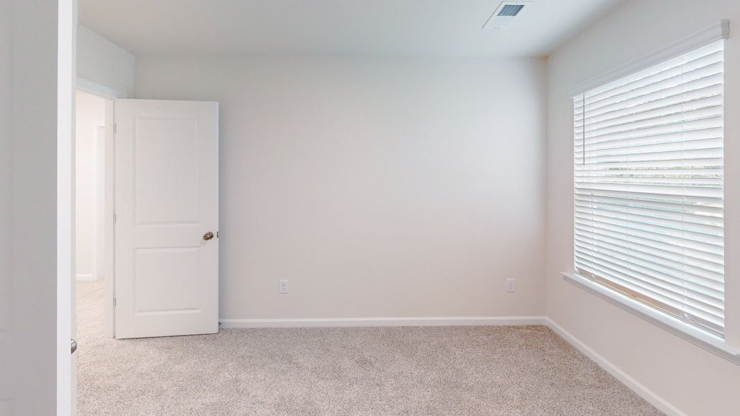 Representative unfurnished interior of a home built from the Stoneycreek Plan for Meece by Veranda Homes in Meece, Easley (Image 28).
