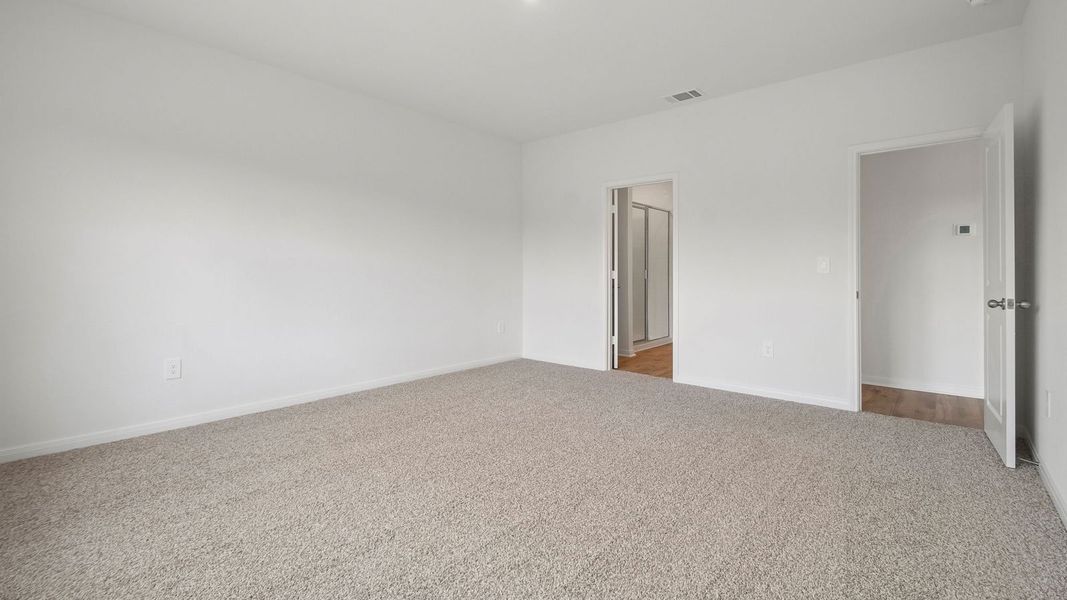 Spacious, unfurnished interior of a new home in Prairie Lakes, Buda (Image 25).