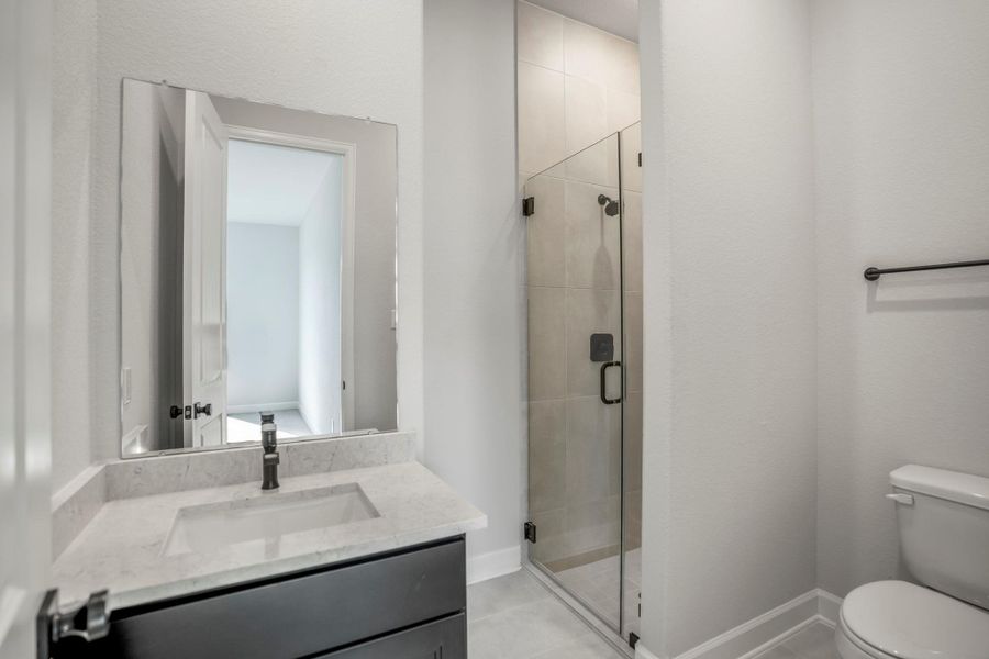 Furnished interior view inside a new home in Sienna 70′ Lots, Missouri City (Image 14).