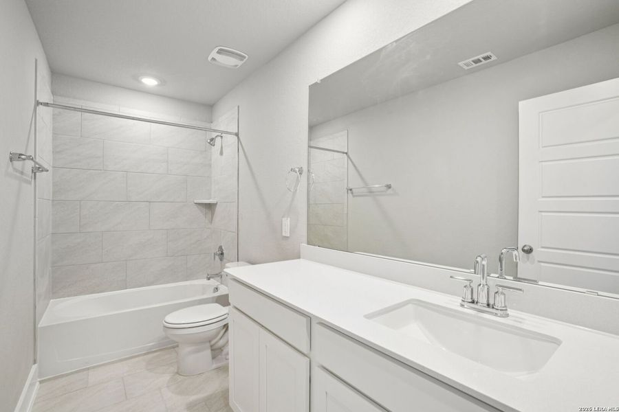 Furnished interior view inside a new home in Legendary Trails - Premier Series, Cibolo (Image 9).