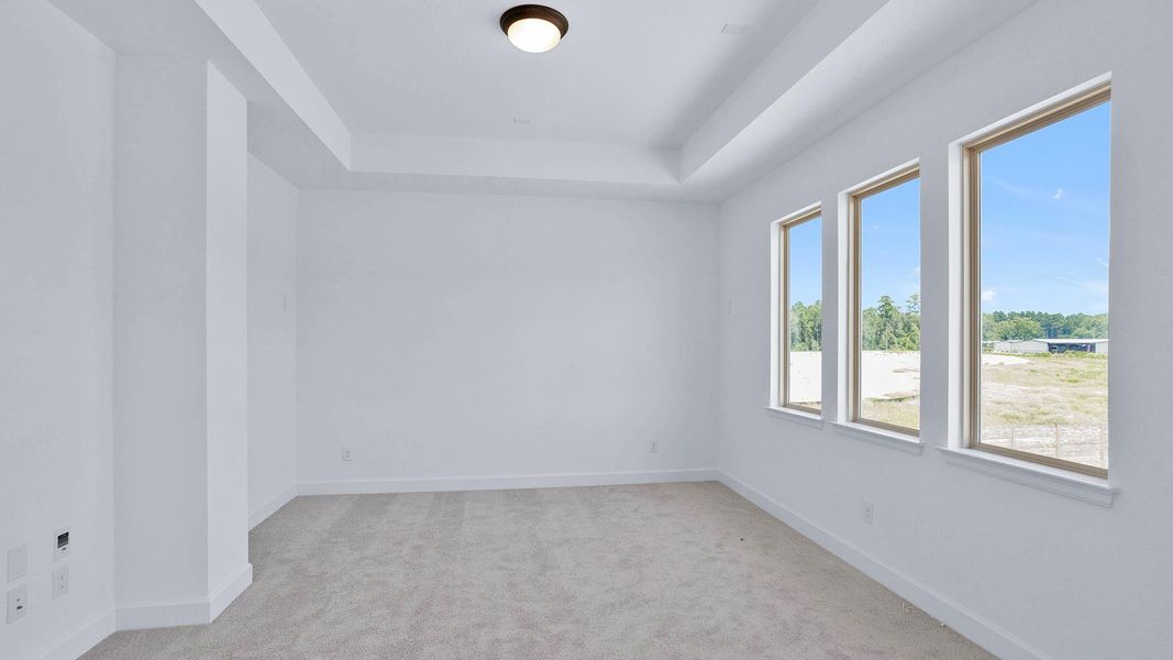 Spacious, unfurnished interior of a new home in Artavia 50', Conroe (Image 14).