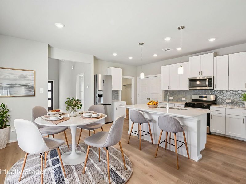 Furnished interior view inside a new home in Granger Pointe - Traditional Series, Conroe (Image 3).