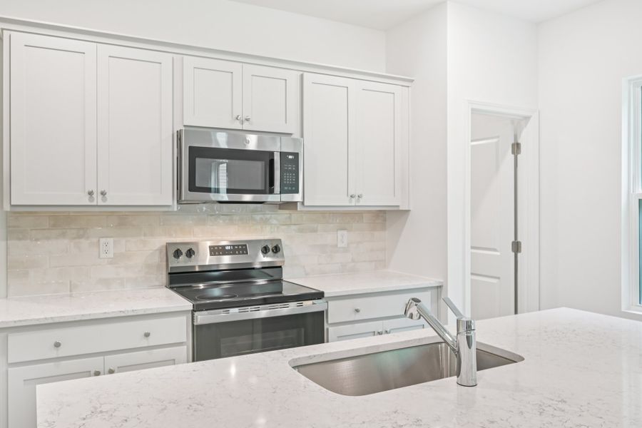Representative furnished interior of a home built from the Brooke by Ashton Woods in Middleton Farms, Middlesex (Image 3).