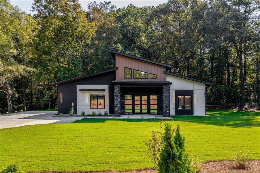 Front exterior of a new home in , Winder, GA, highlighting curb appeal (Image 32).