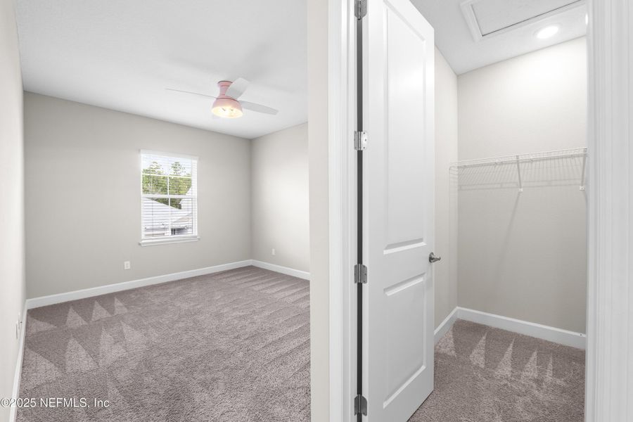 Furnished interior view inside a new home in The Cove at Beachwalk, St. Johns (Image 32). Furnished interior view inside a new home in The Cove at Beachwalk, St. Johns (Image 32).