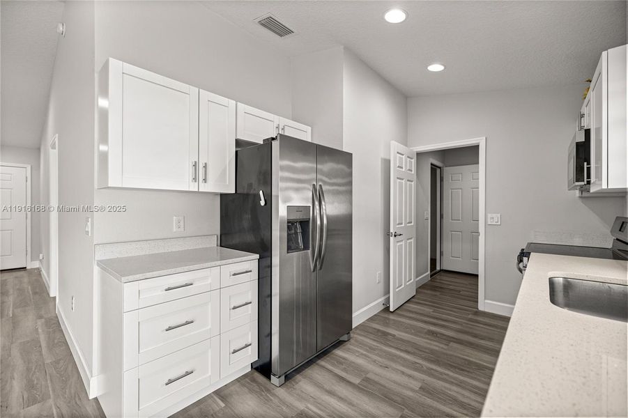 Furnished interior view inside a new home in , Dunnellon (Image 6).