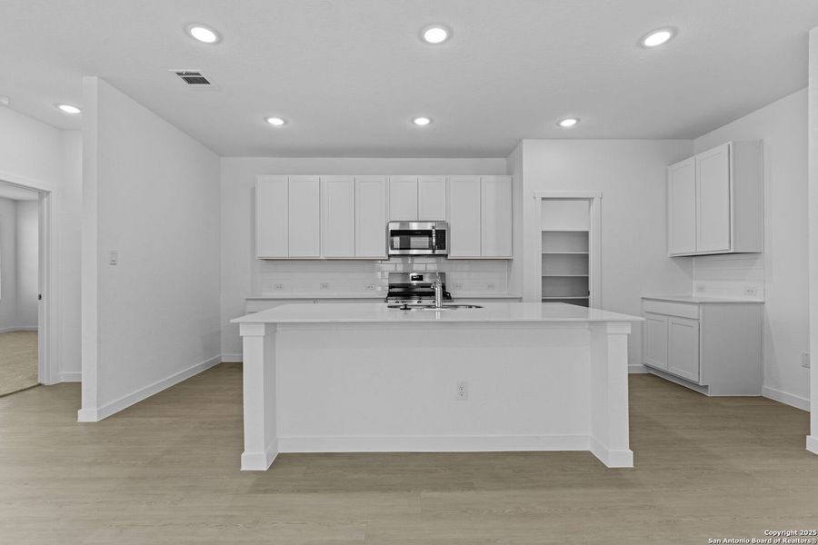 Furnished interior view inside a new home in , New Braunfels (Image 9).