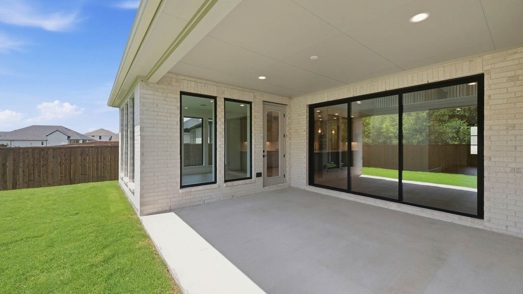 Exterior details and patio area of a home in Sonoma Verde, McLendon-Chisholm (Image 3).