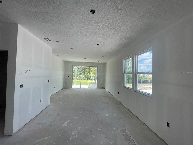 Spacious, unfurnished interior of a new home in Palm Series at Seminole Palms, Palm Coast (Image 22).