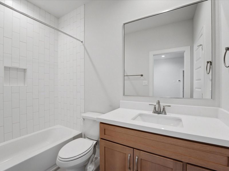 Furnished interior view inside a new home in The Corner At Buffalo Pointe, Houston (Image 6). Furnished interior view inside a new home in The Corner At Buffalo Pointe, Houston (Image 6).
