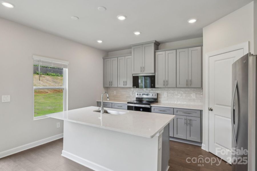 Photo is not of the actual home, but is an inspirational photo of builder’s model home and may depict options, furnishings, and/or decorator features that are not included Photo is not of the actual home, but is an inspirational photo of builder’s model home and may depict options, furnishings, and/or decorator features that are not included