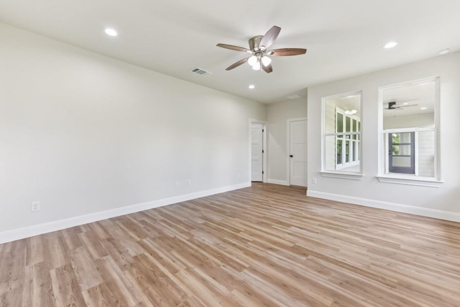 Primary Bedroom with view of back porch and greenbelt area Primary Bedroom with view of back porch and greenbelt area