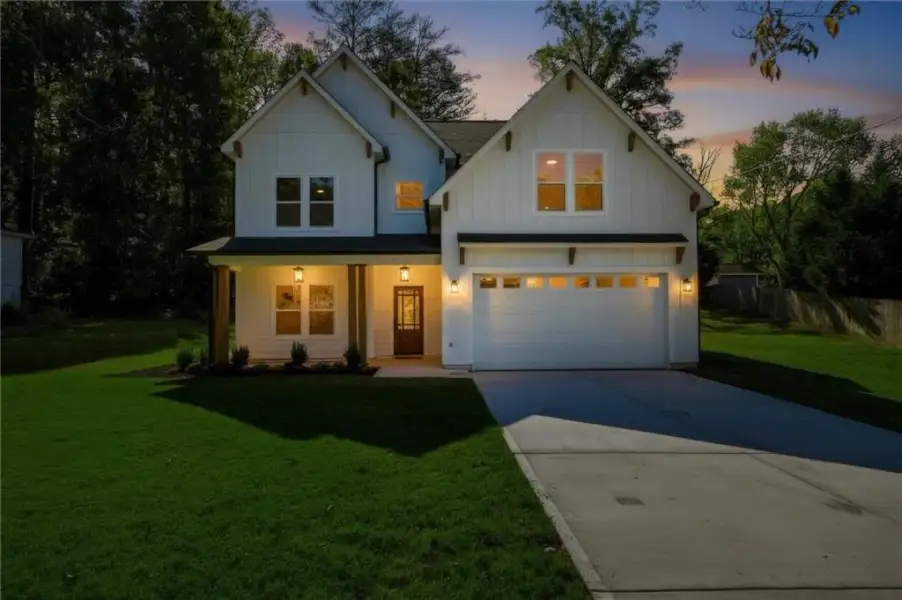 Front exterior of a new home in , Austell, GA, highlighting curb appeal (Image 26). Front exterior of a new home in , Austell, GA, highlighting curb appeal (Image 26).