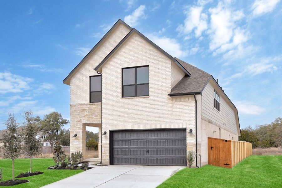 Front exterior of a new home in Parmer Ranch, Georgetown, TX, highlighting curb appeal (Image 18).