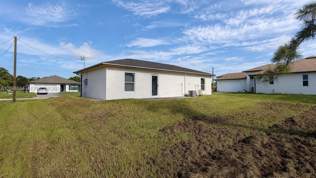 Exterior details and patio area of a home in , Lehigh Acres (Image 4).
