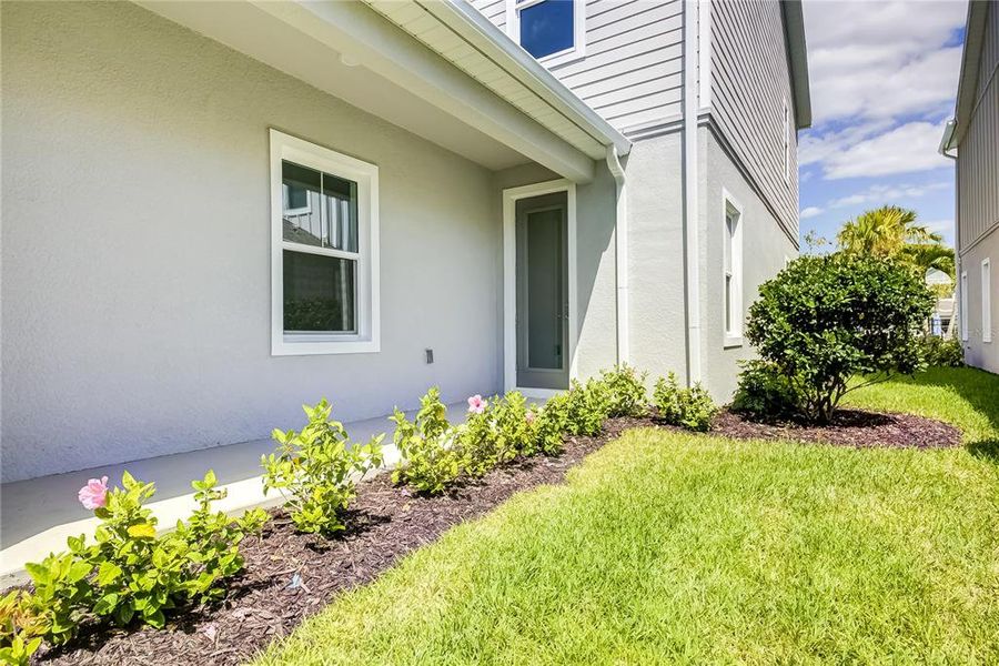 Exterior details and patio area of a home in Bungalow Walk at Lakewood Ranch, Sarasota (Image 22).