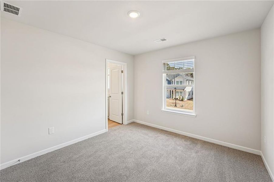 Spacious, unfurnished interior of a new home in Westmont Preserve, Powder Springs (Image 54).
