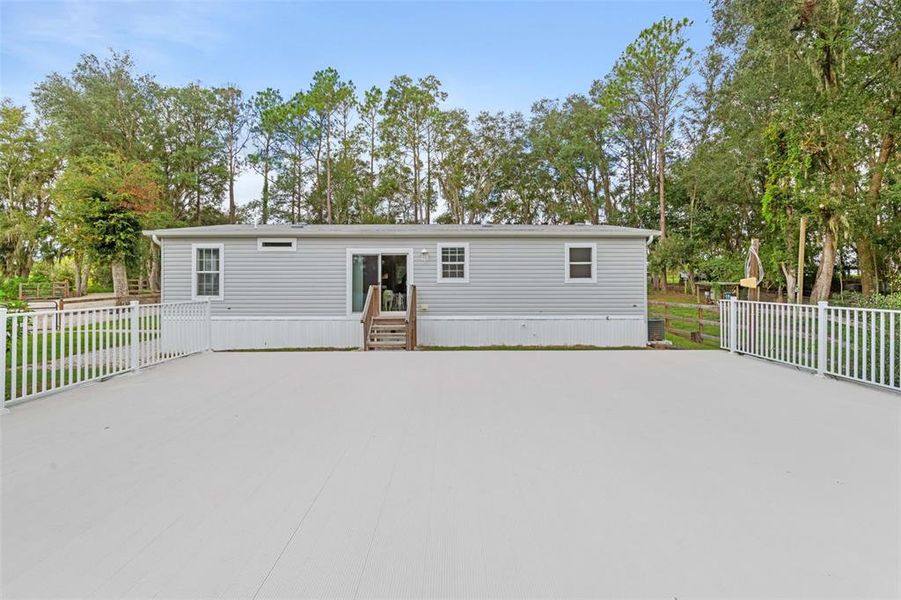 Exterior details and patio area of a home in , Brooksville (Image 36).