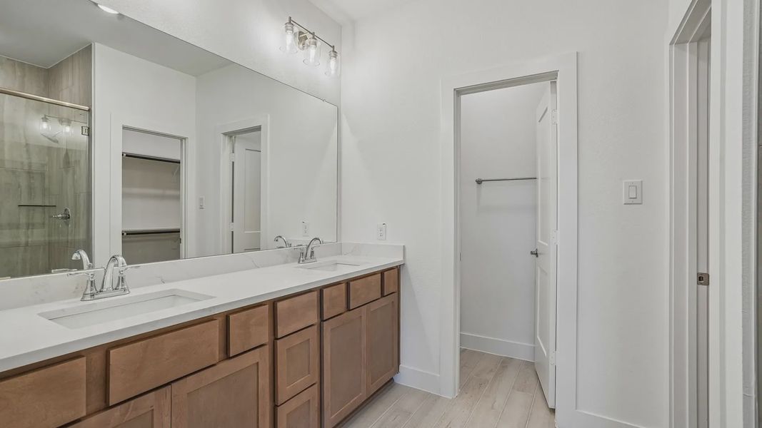 Furnished interior view inside a new home in Meridiana Townhomes, Iowa Colony (Image 8).