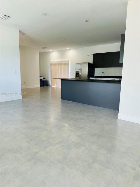 Spacious, unfurnished interior of a new home in , Miami (Image 8). Spacious, unfurnished interior of a new home in , Miami (Image 8).