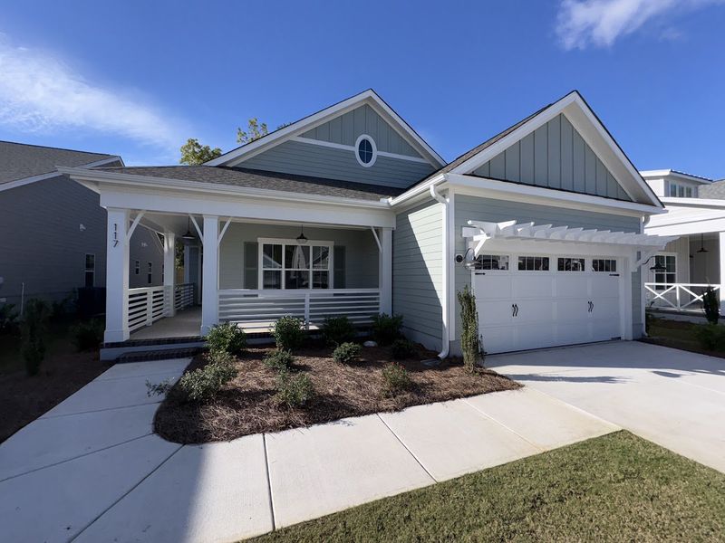 Exterior details and patio area of a home in Riverside Cove, Wilmington (Image 2). Exterior details and patio area of a home in Riverside Cove, Wilmington (Image 2).