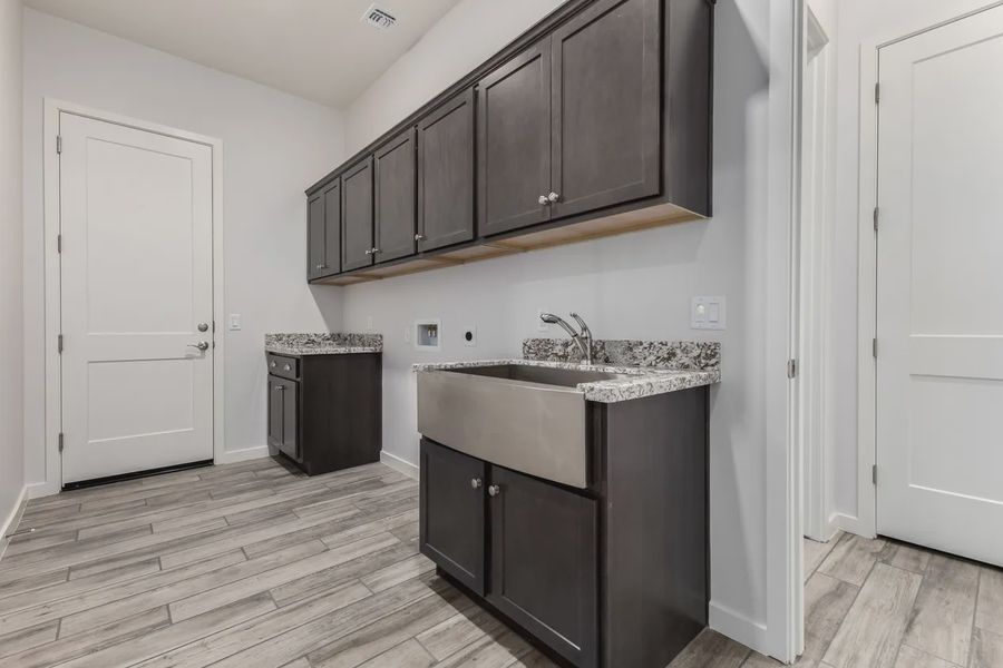 Furnished interior view inside a new home in Valencia at Granite Vista, Waddell (Image 14).