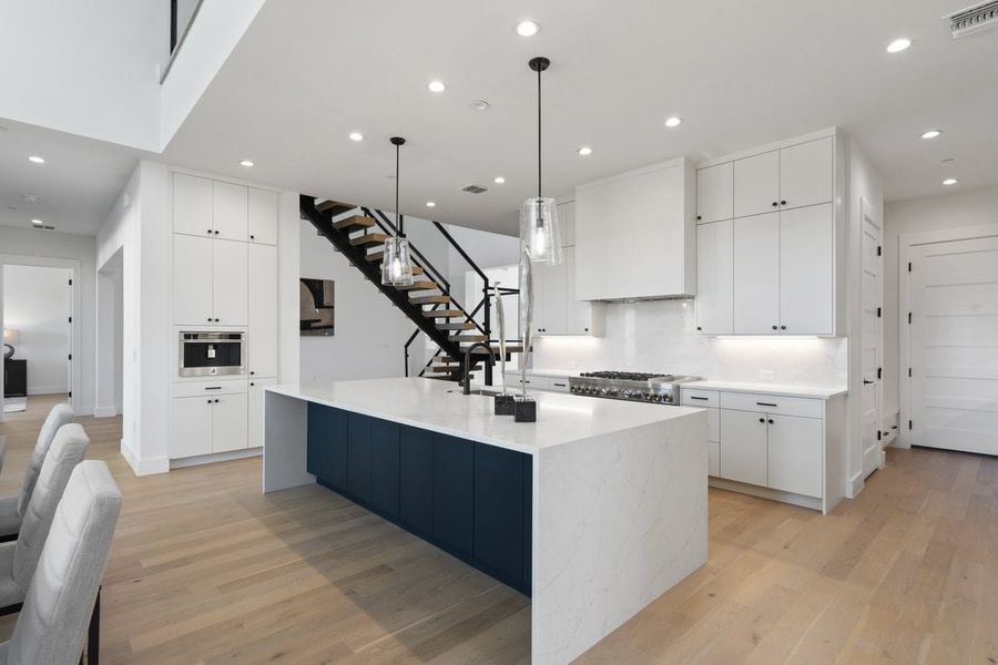 Furnished interior view inside a new home in Milky Way at River Place, Austin (Image 34). Furnished interior view inside a new home in Milky Way at River Place, Austin (Image 34).