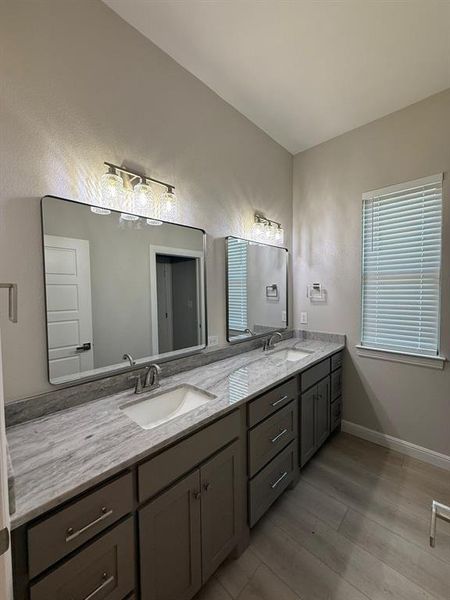 Full bathroom featuring double vanity