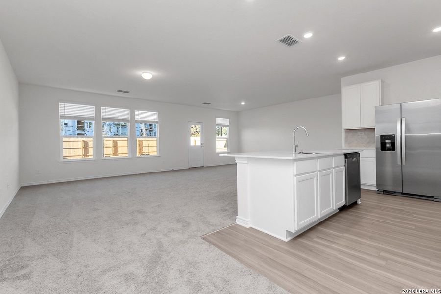 Spacious, unfurnished interior of a new home in Preserve at Culebra - Heritage Collection, San Antonio (Image 7).