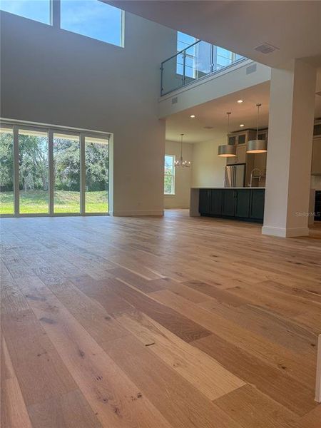 Great Room, kitchen, lanai and upstairs loft