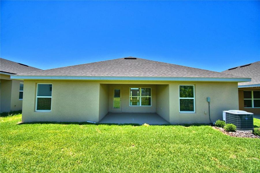Exterior details and patio area of a home in Magnolia Park, Haines City (Image 21).